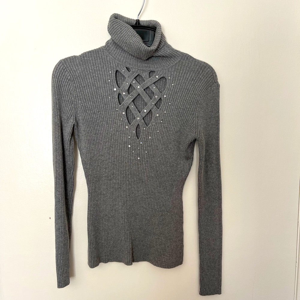 Cache long sleeve turtleneck sweater with criss cross and rhinestone detailing